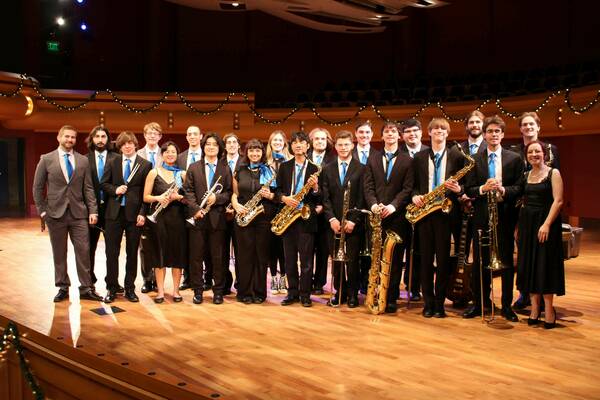 The ND Jazz Bands pose on stage at the DeBartolo Performing Arts Center on campus prior to one of their concerts